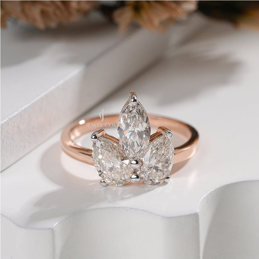 Elegant Marquise Triple Diamond Ring with Pear Side Diamond