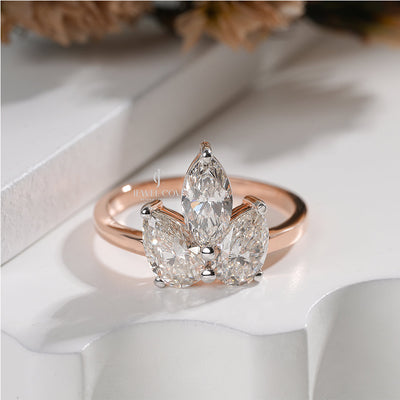 Elegant Marquise Triple Diamond Ring with Pear Side Diamond