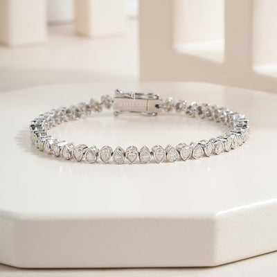 White Gold Moissanite Pear-Shaped Diamond Tennis Bracelet with Elegant Bezel Setting