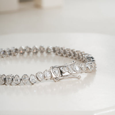White Gold Moissanite Pear-Shaped Diamond Tennis Bracelet with Elegant Bezel Setting