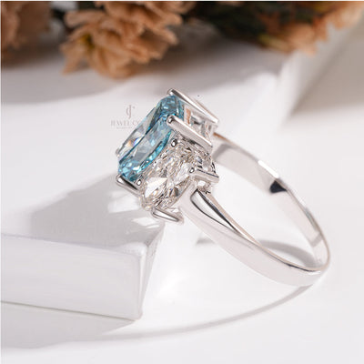 Three Stone Ring with Emerald Cut Blue Diamond and Oval Ring