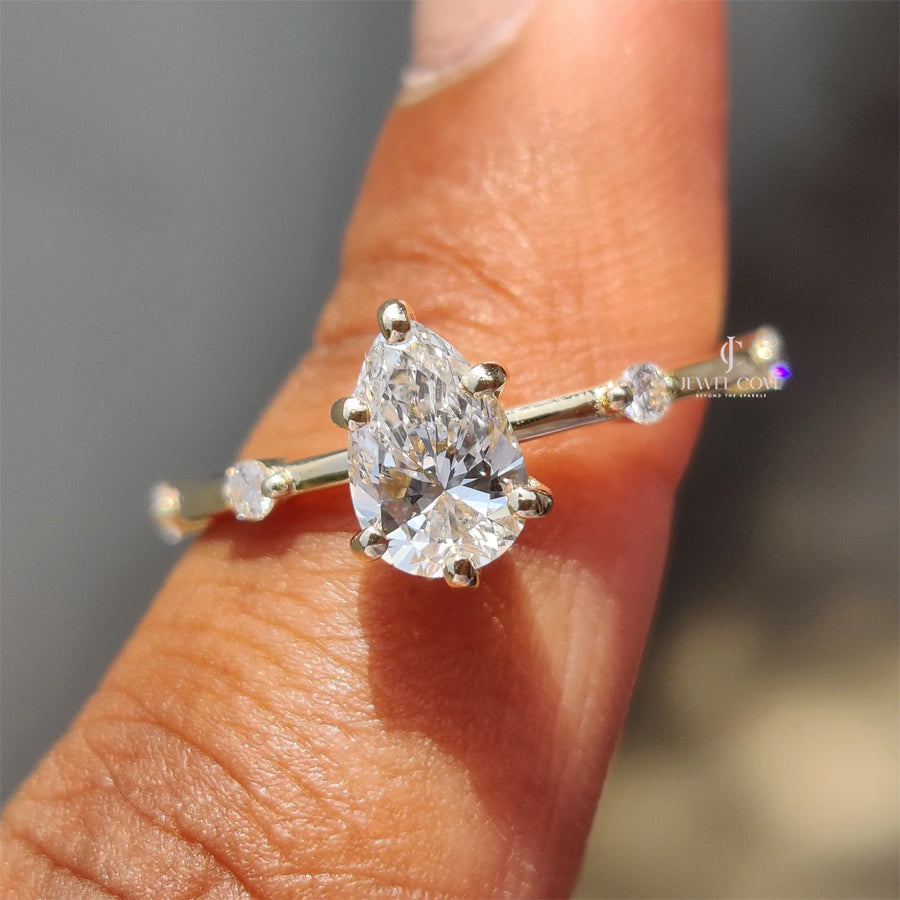 0.70CT Pear Moissanite Distance Pave Setting Diamond Ring | 925 Silver
