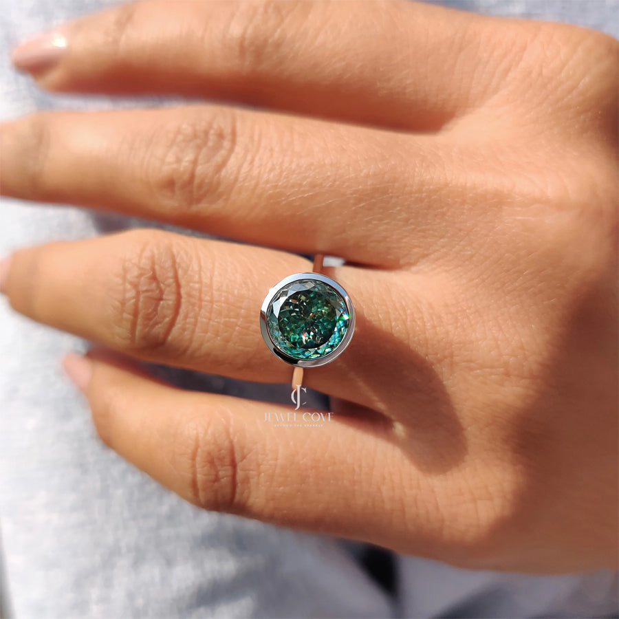 Portuguese Cut Engagement Ring In Bezel Setting | Moissanite Diamond | Cyan Blue solitaire ring | IGI Certified