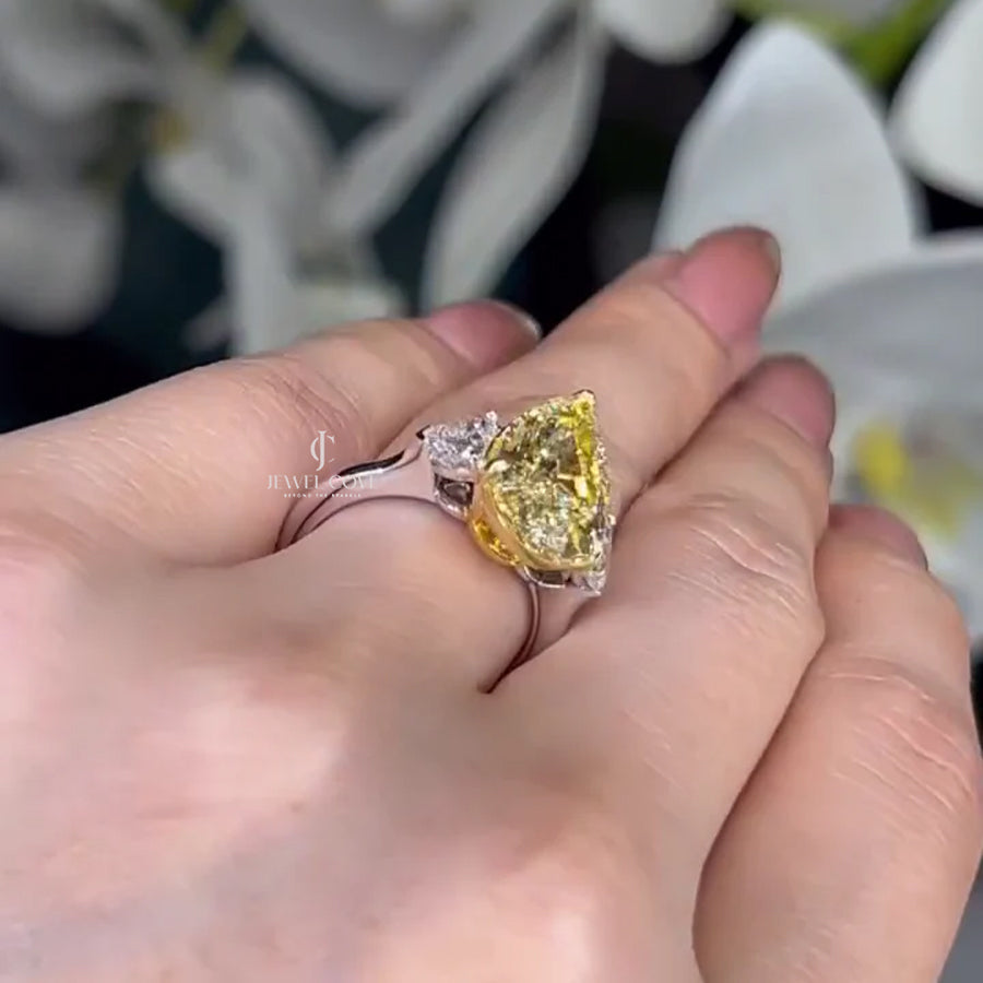 Pear Fancy Yellow 5.00tcw Lab Diamond Two Tone Three Stone Ring | Cathedral Setting | VVS–VS