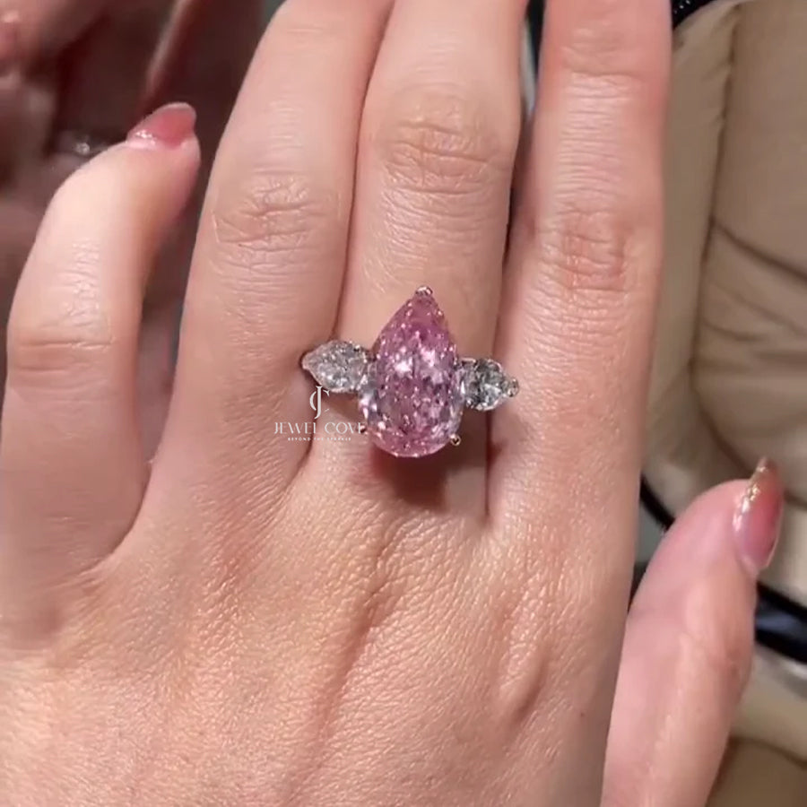 Fancy Pink 7.00tcw Lab Grown Three-Stone Engagement Ring | Pear Shape | IGI Certified