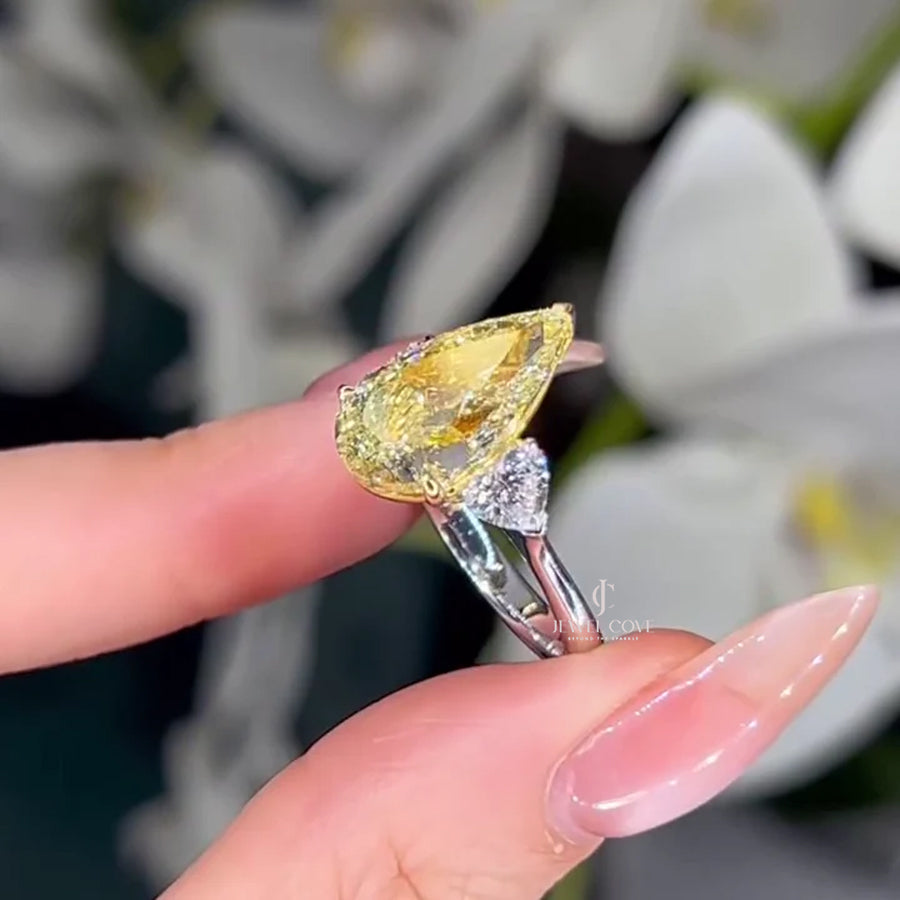 Pear Fancy Yellow 5.00tcw Lab Diamond Two Tone Three Stone Ring | Cathedral Setting | VVS–VS