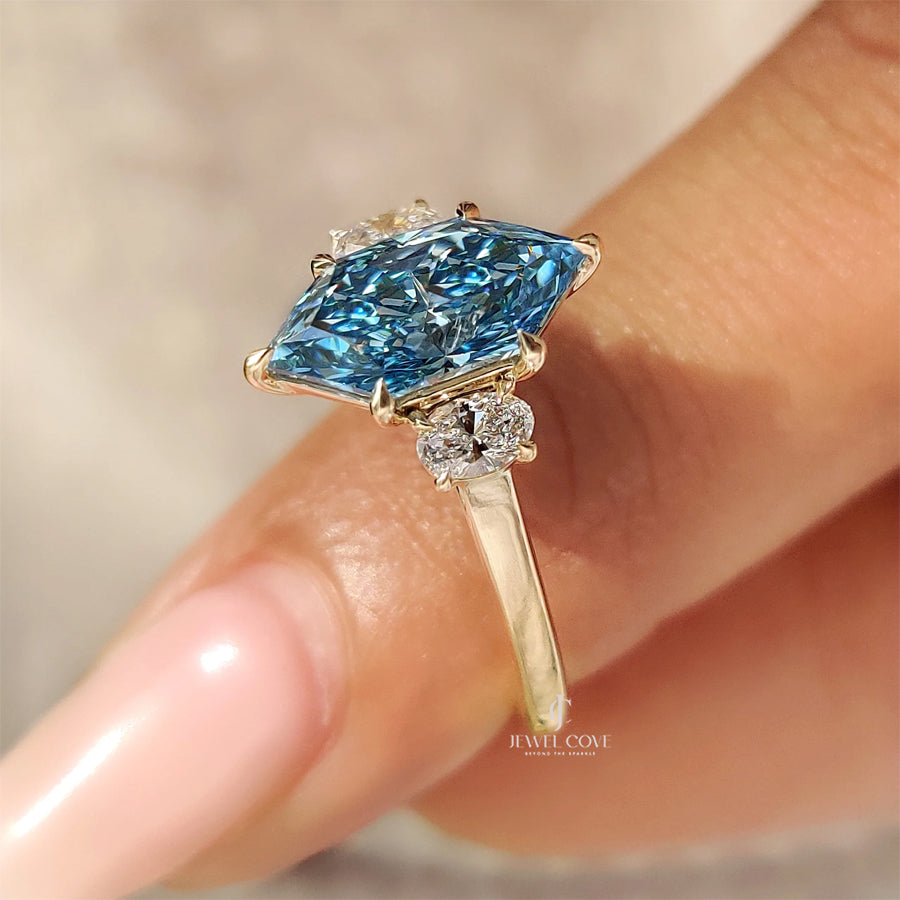 Blue Dutch Marquise Trilogy Engagement Ring with Oval Side Stones | Lab Grown Diamonds | IGI Certified