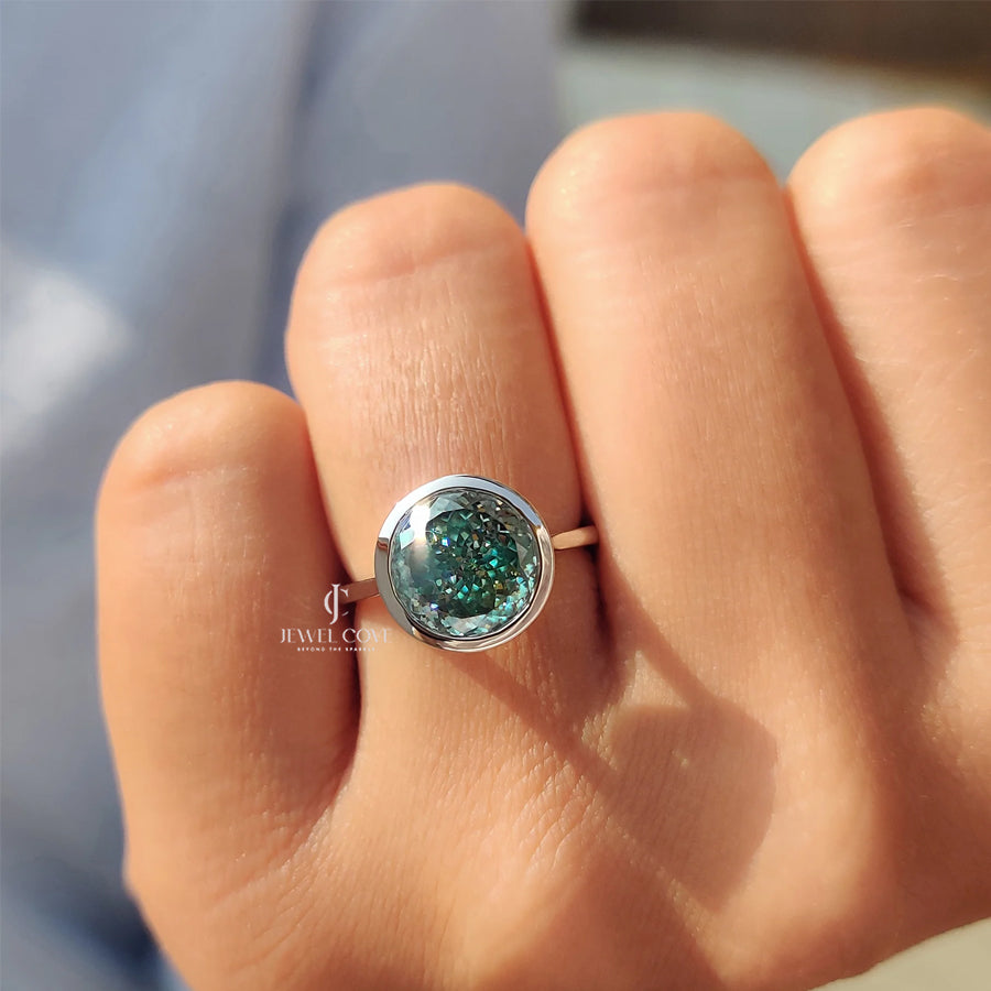 Portuguese Cut Engagement Ring In Bezel Setting | Moissanite Diamond | Cyan Blue solitaire ring | IGI Certified