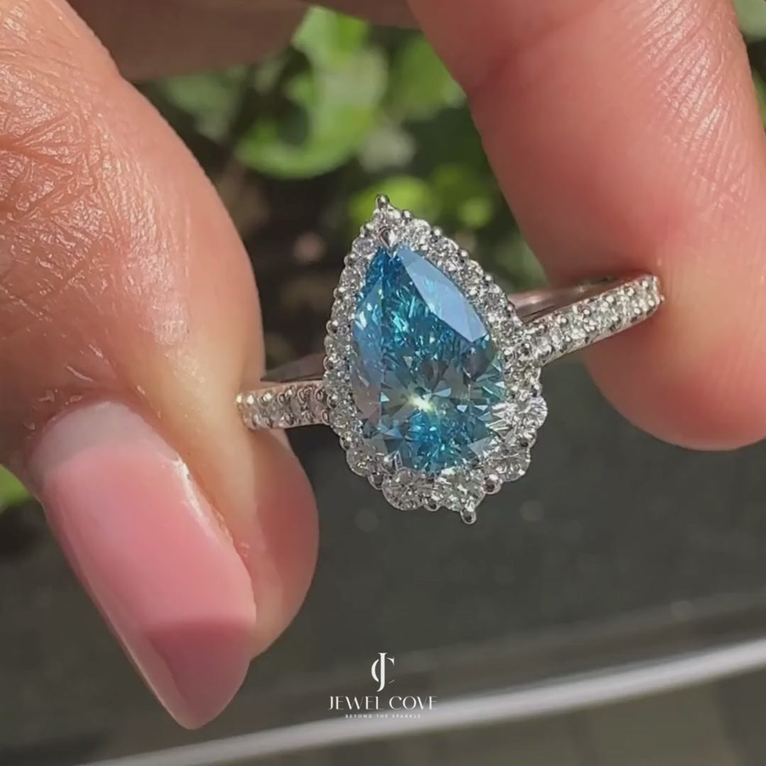 Cyan Blue Pear Diamond Ring In cathedral setting | Lab Grown Diamonds | IGI Certified
